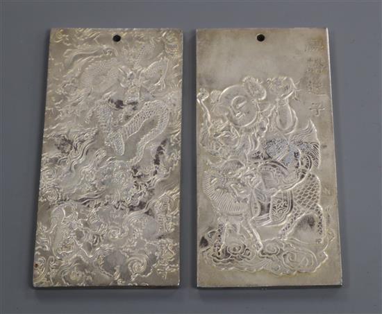 Two Chinese white metal plaques 10cm high x 5cm wide